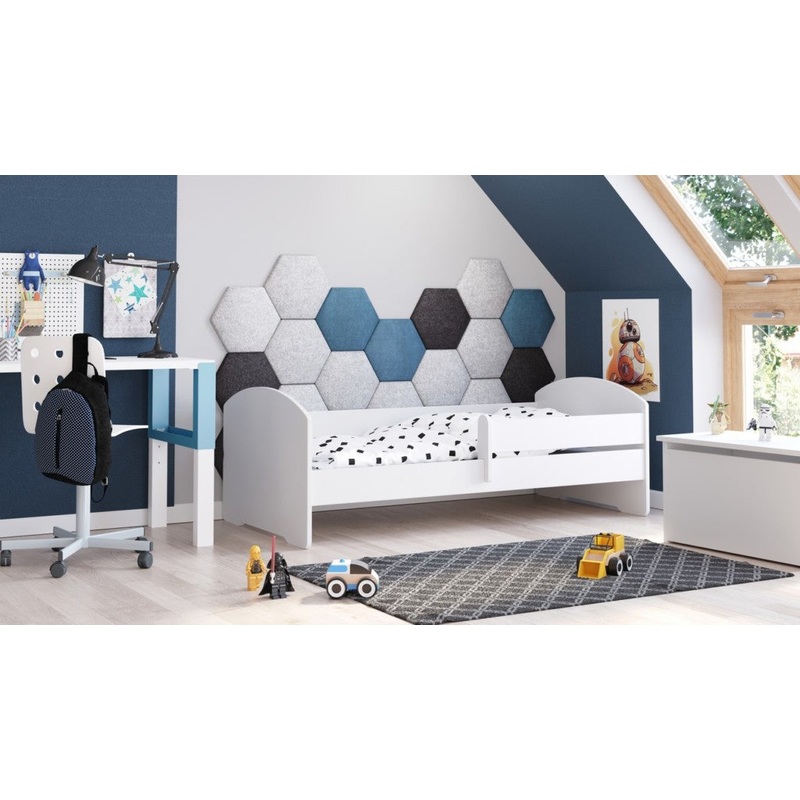 Children’s bed with a railing